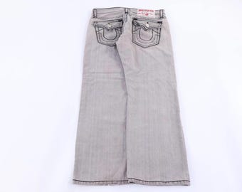 Vaqueros True Religion grises