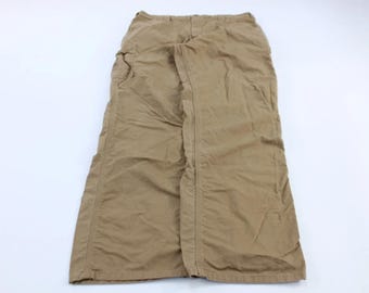 Pantalones holgados de corte original color caqui con parche del logotipo de Carhartt