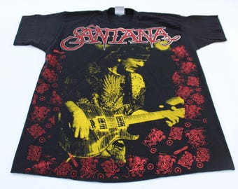Camiseta con estampado integral de Carlos Santana de los 90
