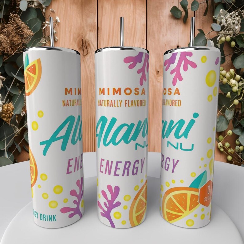 May include: Three white insulated tumblers with silver straws. Each tumbler features the text "MIMOSA" and "ENERGY" with orange slice and coral graphics. The tumblers are designed for a refreshing drink.
