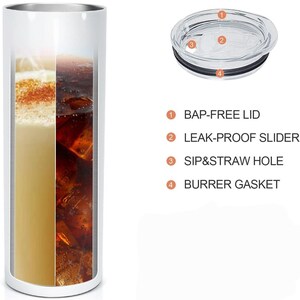 May include: A white insulated tumbler with a silver rim, shown with a clear lid. The tumbler is filled with a beverage, split into two sections. The lid features a leak-proof slider and a sip and straw hole.