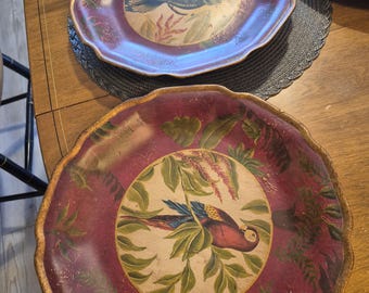 Two ceramic  twelve inch wall or table plates decorative only parrot themed