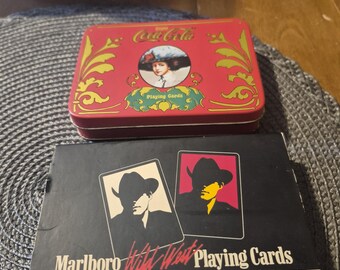 Marlboro wild west double deck, playing cards and coca cola double deck playing cards in collectible , ten