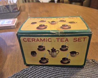 Mini ceramic tea set 4 piece setting Brown color in original box.Missing the teapot