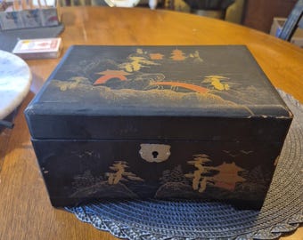 Vintage oriental design black wood music jewelry box.measures 8" x 6"