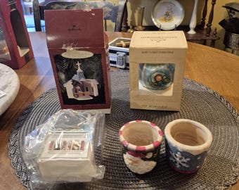 2 Vintage hallmark christmas ornaments brand new and original boxes and two small ceramic teacup candle holders
