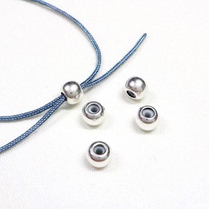 Silver Stopper Beads with Rubber Tube, Slider Stopper Beads, Smart Bead Clasps for Adjustable Bracelets for 2 Cords of 1mm each - 2 pieces