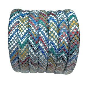 May include: A roll of blue leather cord with a white and multi-colored diamond pattern. The cord is approximately 1/2 inch wide.