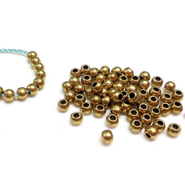 Bolas de zamak de bronce, pequeñas cuentas de bronce, rondelle de metal de bronce, bola redonda de bronce, espaciador de metal diminuto, 3.2x2.6 mm (Ø 1.2 mm) - 30 piezas