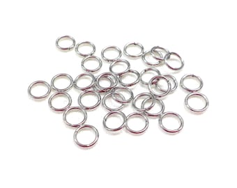 Anillos de salto abiertos de acero inoxidable 304 de 4 x 0,6 mm, calibre 23, resistentes al deslustre, color acero natural de alta calidad, anillos de salto muy pequeños - 100 piezas