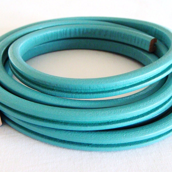 Licorice Turquoise Oval Leather Cord 6.8x9.8mm with Groove, Greek leather Cord, 7 1/2 inches/19cm - 1 piece