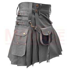 May include: A gray leather kilt with multiple pockets and a small pouch attached to the front. The kilt has a belt with buckles and a chain.