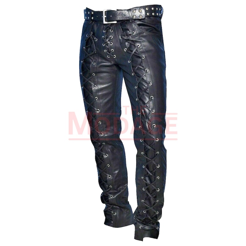 May include: Black leather pants with lace-up detailing on the sides. The pants have a belt with silver studs.