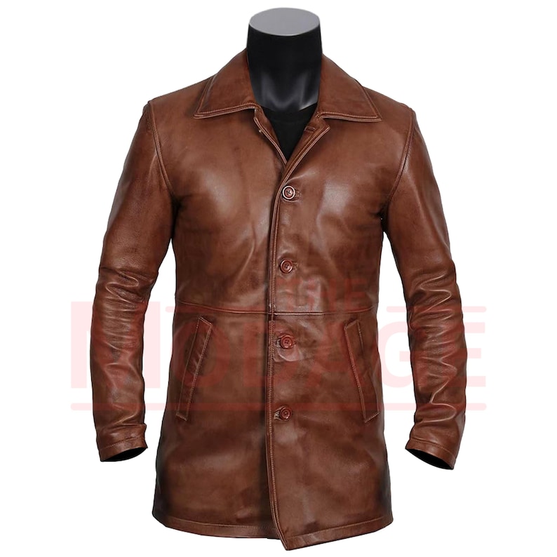 May include: A brown leather jacket with a button-up front and long sleeves.