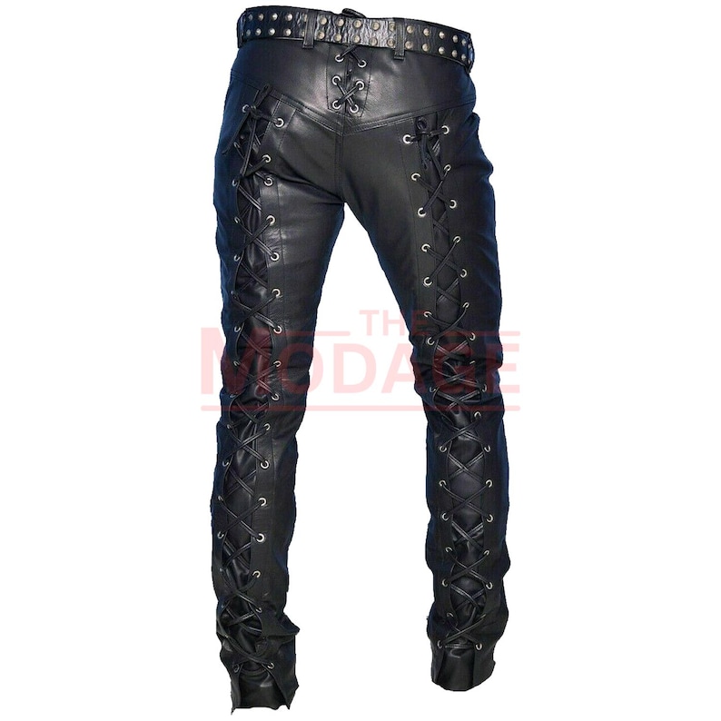May include: Black leather pants with lace-up detailing on the sides. The pants have a belt loop and a buckle closure.