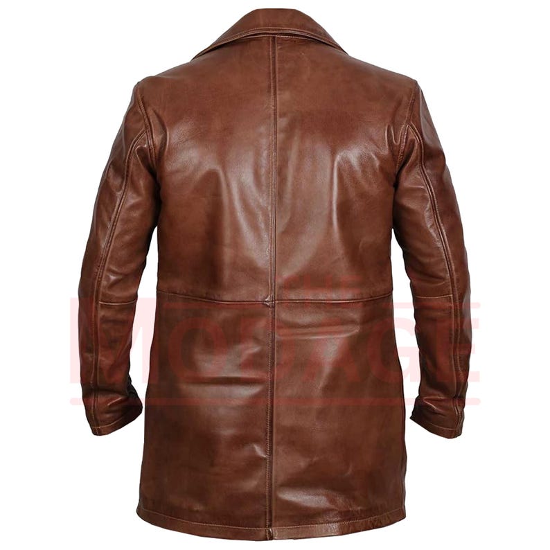 May include: A brown leather jacket with a long cut and a collar. The jacket has a single breasted closure and two pockets on the front.