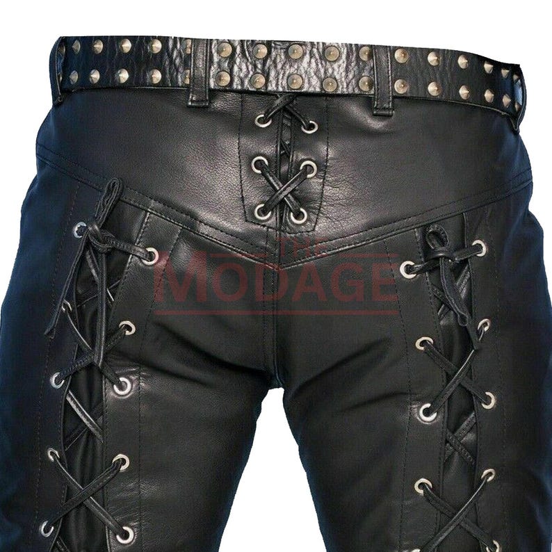 May include: Black leather pants with a lace-up design on the sides and a studded belt.