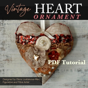Può includere: Un ornamento vintage a forma di cuore con pizzo color crema e paillettes rosse. Presenta un nastro bianco, perle e fiori di stoffa. Il testo "Vintage HEART ORNAMENT" e "PDF Tutorial" sono visibili. Progettato da Elena Loukianova-Wan.