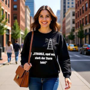 Leuchtturm Sweatshirt | Unisex Pullover Hoffnung Stärke | Strahle egal wie stark der Sturm tobt