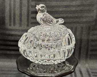 Plato decorativo de cristal Hofbauer con forma de pájaro sobre un huevo