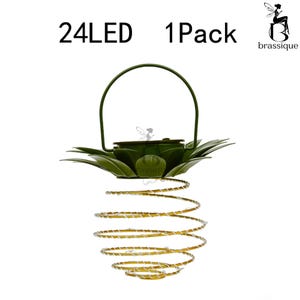 May include: A hanging solar light featuring a green metal top shaped like leaves with a handle and a spiral gold wire body containing 24 LED lights. The text 24LED and 1Pack appears above the object, with a logo in the top right corner.