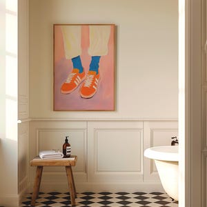 May include: A painting of a pair of orange sneakers with blue socks on a pink background.