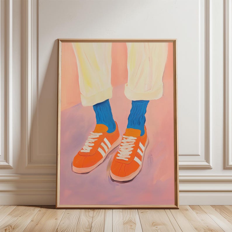 May include: A painting of a pair of orange sneakers with white stripes and blue socks. The sneakers are on a pink background.