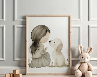 May include: A framed watercolor print depicts a girl and a puppy in soft, neutral tones. The girl, with brown hair, is kneeling and looking at the puppy. The puppy is light beige. The print is in a light wood frame. A stuffed bunny and wooden blocks are nearby.