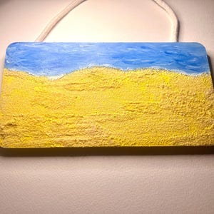 Painted wooden board to hang