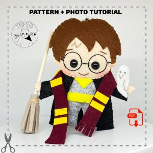 May include: Felt pattern and photo tutorial for making a Harry Potter character doll. The doll is wearing a black robe with a red and yellow scarf. The doll is holding a broom and a white owl.