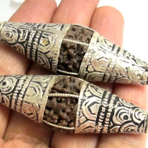 2 Beads - Long bicone Nepal 5 mukhi natural rudraksha beads encased in tibetan silver floral cap melon design mala making - NB124