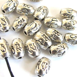 4 BEADS - Tibetan om mantra etched silver tone metal beads 9 mm x 6 mm - BD605
