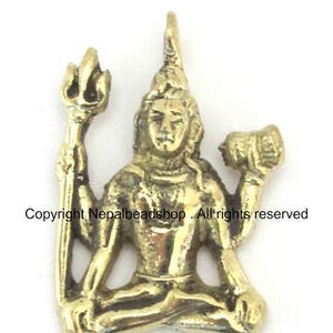 Hindu Lord Shiva seated with trident and dumru brass pendant - CP041 custom design copyright Nepalbeadshop