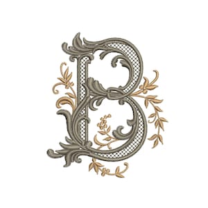 May include: An embroidered letter "B" in a decorative, ornate style. The letter is a muted gray-green color with gold-colored floral accents. The design features intricate details and a vintage aesthetic, perfect for monograms or personalized crafts.
