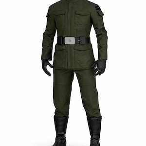 May include: Olive green military-style uniform with a high collar, four front pockets, and a black belt with a silver buckle. The outfit includes matching pants, black gloves, and knee-high black boots. Two black stripes are on the left shoulder.