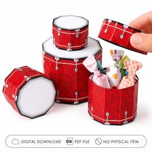 May include: A set of red drum-shaped paper boxes with white tops and black trim. One box is open, revealing colourful wrapped sweets inside. The text at the bottom reads: DIGITAL DOWNLOAD, PDF FILE, NO PHYSICAL ITEM.