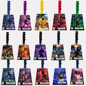 May include: A selection of football-themed keyrings with different coloured handles. Each keyring displays a football player image, the number 12 or 13, the year 2025, and the name "WILLIAM" or "SOPHIE". The keyrings have a team name and a logo.