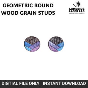May include: A pair of geometric round wood grain stud earrings with a blue, purple and pink colour scheme. The earrings are made of wood and have a natural wood grain finish.