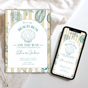 May include: A baby shower invitation with a beach theme. The design features a seashell graphic and the text "Beach Bum On The Way". The invitation is on a cream background with vertical stripes and teal seashell illustrations. A smartphone displays the same design.