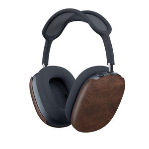 May include: Over-ear headphones with a dark grey headband and earcups. The earcups have brown leather covers. The headphones have a mesh fabric on the headband and earcups. The design is modern and sleek.