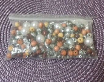 Collection of beads (assorted wooden and metal)