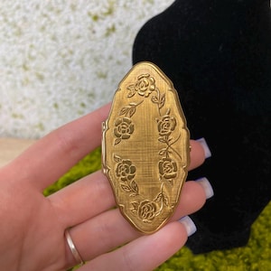 May include: A rustic wooden sign with the text "Welcome to our home" in a handwritten style. The sign is rectangular, with a distressed finish, and features a simple, inviting design. It's suitable for indoor or outdoor use.