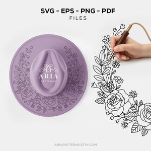 Puede incluir: Un sombrero de color lavanda con un diseño floral y el texto "ARIA PATTERNS". La imagen también presenta una ilustración floral en blanco y negro y el texto "SVG - EPS - PNG - PDF FILES".