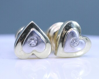 Diamond and gold heart-shaped stud earrings in 585 gold