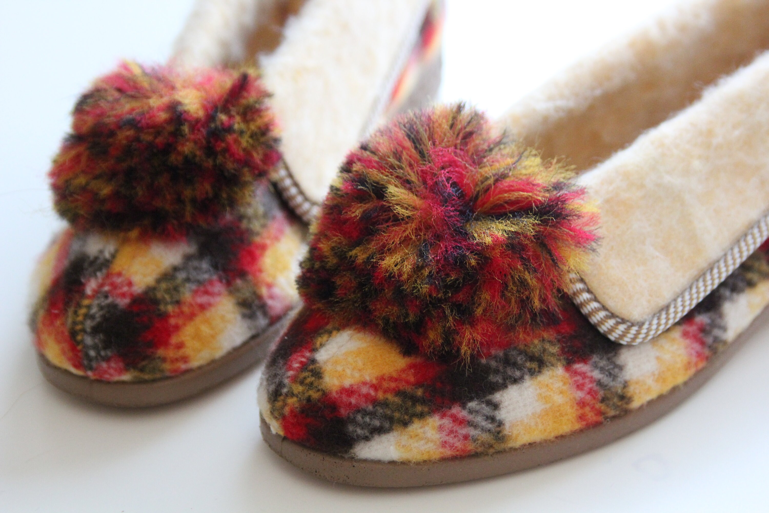 tartan slippers with pom poms