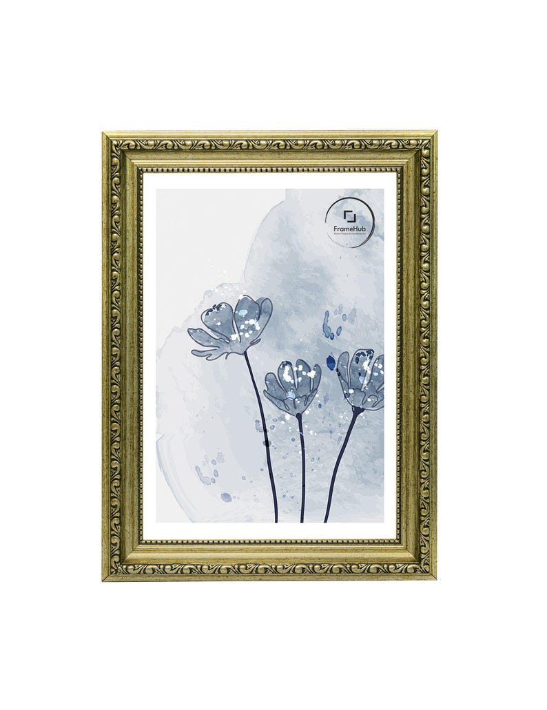 May include: A rectangular gold-colored picture frame with ornate detailing surrounds a print of blue watercolor flowers. The artwork features three stylized flowers with dark stems against a light blue and white background. The frame has a decorative border.