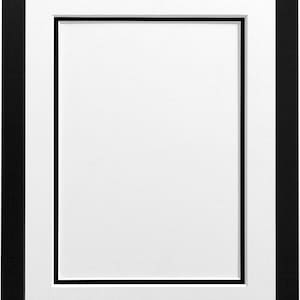 May include: A black picture frame with a white mount and a double black border.