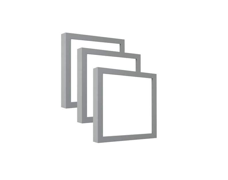 May include: Three grey square frames, each slightly offset from the other, creating a layered effect. The frames have a simple, modern design with a clean, minimalist aesthetic. The background is plain white.