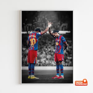 May include: A framed digital download featuring two soccer players in red and blue uniforms, high-fiving on a field. The background is a black and white stadium scene. One player wears the number 10 on their jersey.