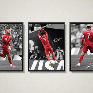 May include: A set of three framed black and white photographs featuring a football player in a red jersey with the number 7. The player is shown in various poses on a pitch, with a signature visible on each print. The frames are thin and black.